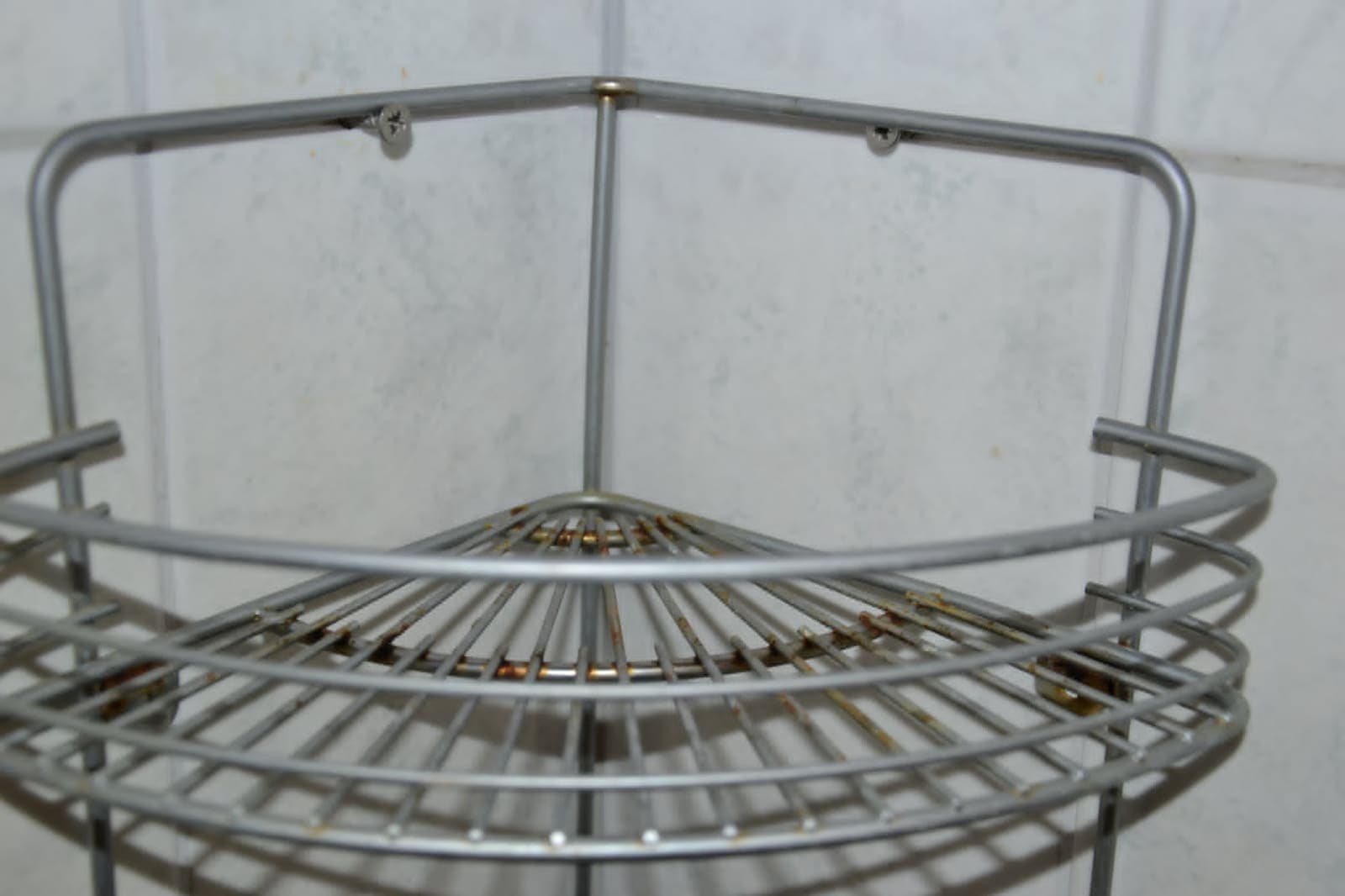 Rust-stained shower basket