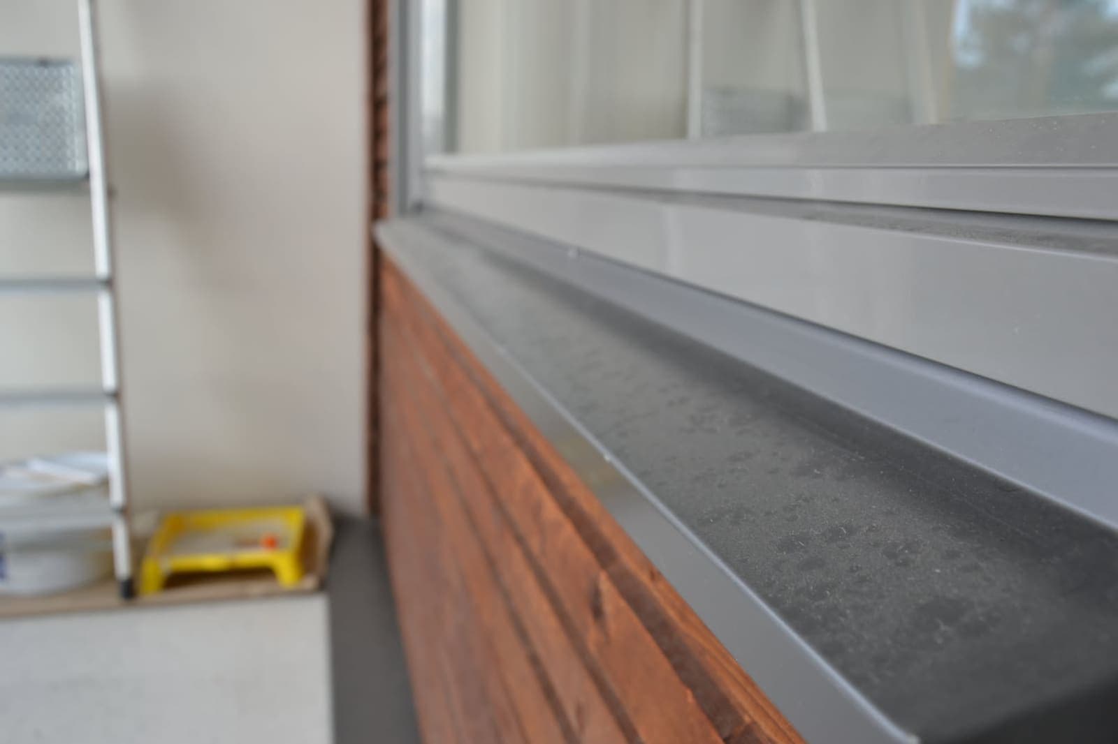 Balcony window sill — renovation dust cleared — Before