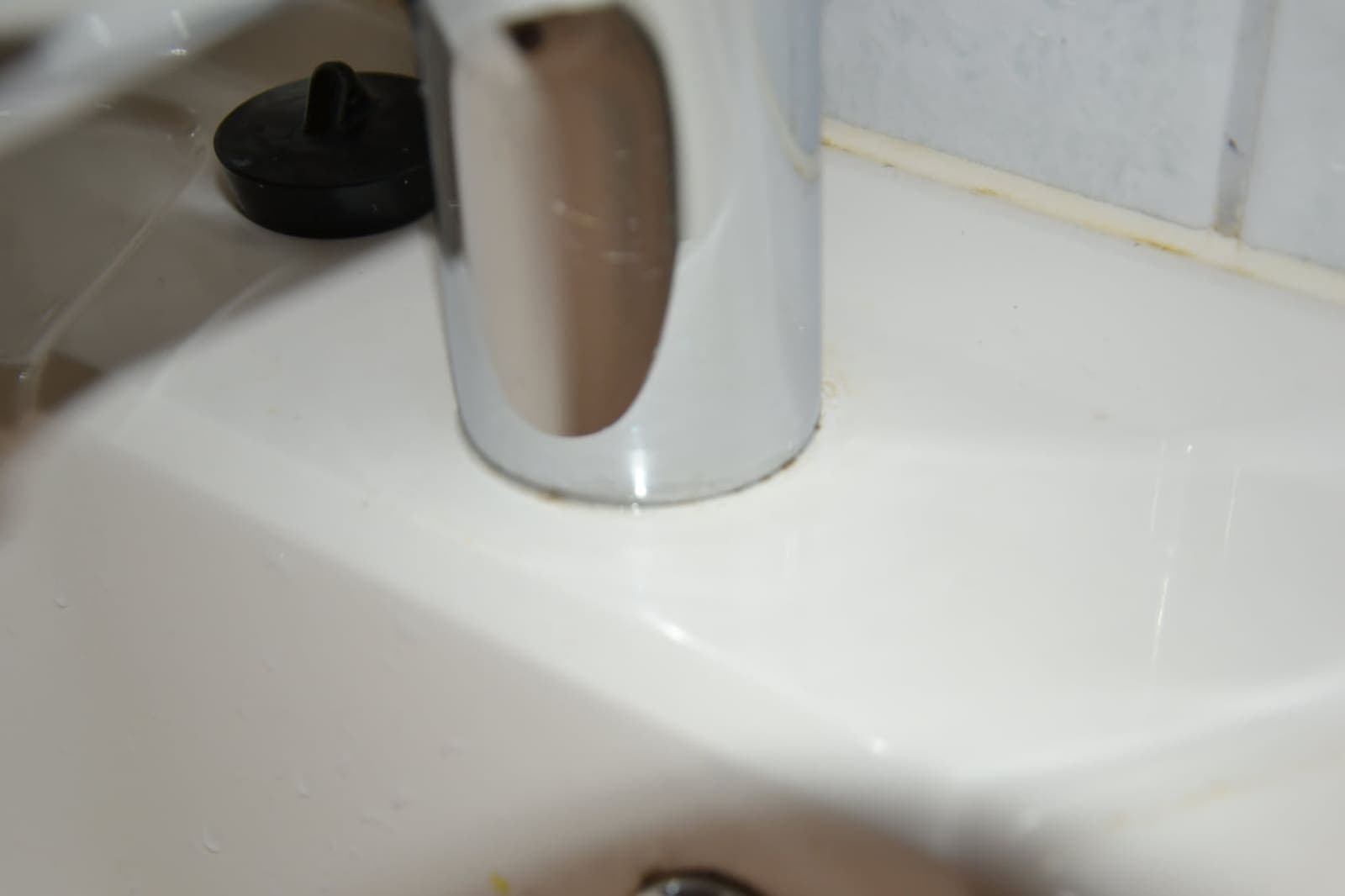 Limescale cleared from the tap base — Before