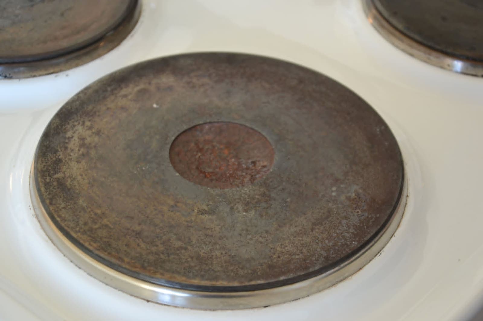 Hob plate — burnt-on grease removed — After